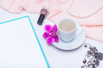 Flat lay, top view feminine desk workspace with coffee, paper blank. Ideas, notes or plan writing concept.