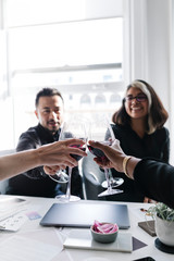Professional business celebrating with wine
