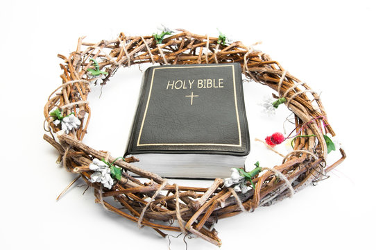 Holy Bible. Crown of thorns. On a white table.