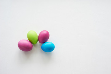 Painted multicolored eggs against a light background. Diet, protein, protein. Preparing for Easter.
