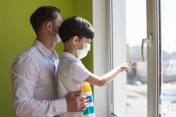 Father with son at home during the coronavirus quarantine.