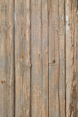 background of old wooden boards with cracks and nails