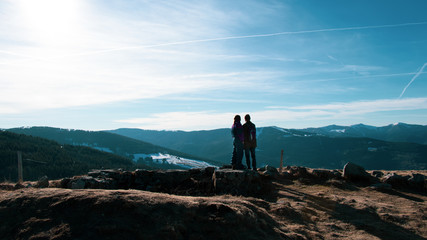 hiking couple in the mountains