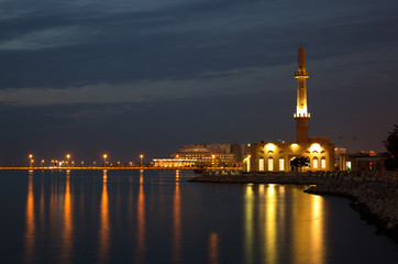 Fototapeta na wymiar Hanan Ali Kanoo Mosque at Al Ghous Park during blue hours, Bahrain