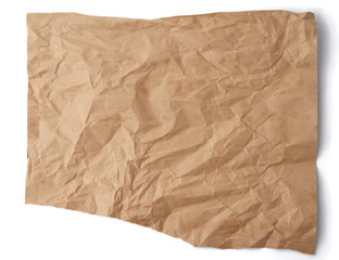 piece of crumpled brown paper isolated on white background