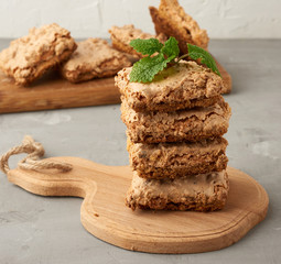 baked Krakow meringue cookies on a wooden board, delicious dessert of whipped egg whites