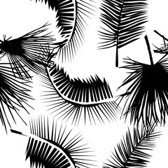 A seamless background of palm leaves. Vector illustration