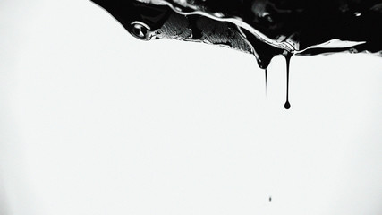 oil flowing from a pipe