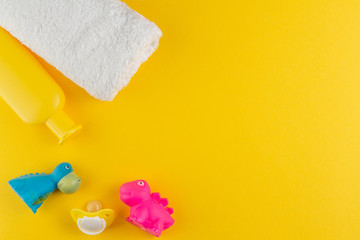 Baby, newborn child care hygiene accessories. Kid, infant health product on yellow background. concept of child care