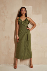 Fashion model brunette hair wear green silk dress sandals high heels accessory bag clothes for date...