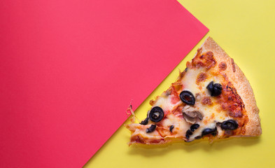 Slice of pizza on a colorful background