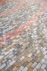 Close up shot of brick floor tiles in a park