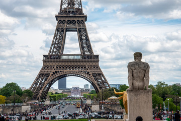 View from Trocadero Garden to the Eiffel Tower, a stone Sculpture of the Garden in the foreground, Paris/France