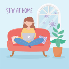 quarantine stay at home, woman working with laptop on sofa in room with plant