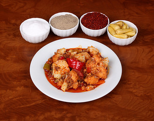 very nice mince cauliflower turkish spicy on white plate wooden table