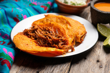 Mexican beef  birria tacos on wooden background