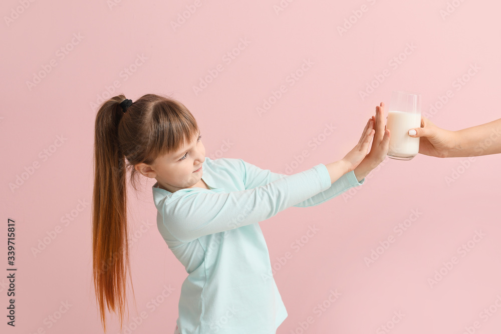 Wall mural little girl with milk allergy on color background