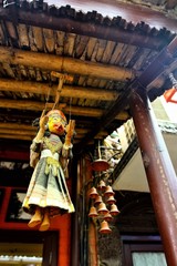 Low Angle View Of Puppet Hanging From Roof