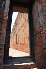  Framed Doorway in Temple Complex Surrounded by Brick Courtyards