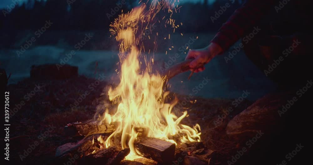 Wall mural camping, bonfire burns in nature, night.