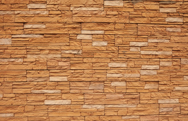 Obraz premium Brick background, wall or texture of orange blocks