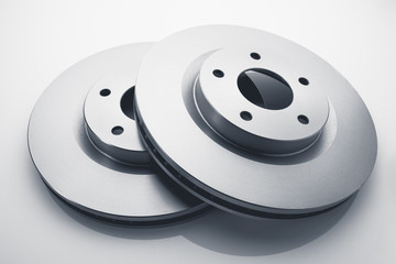 car brake discs on white background