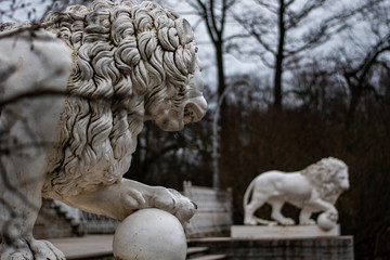 sculpture of a lion in the park