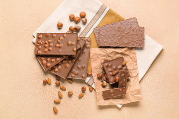 Sweet chocolate with nuts on table