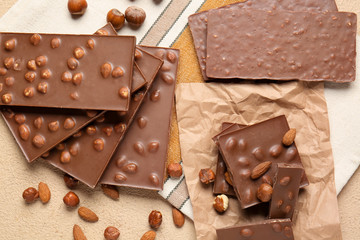 Sweet chocolate with nuts on table