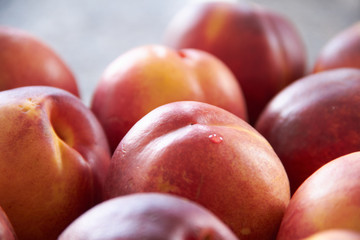 Fresh Peaches on a cutting board