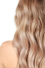 Young blonde with beautiful hair on white background