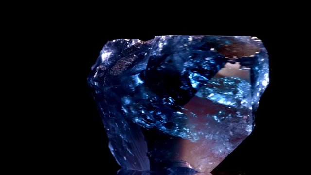crystal blue ice. rotation black background