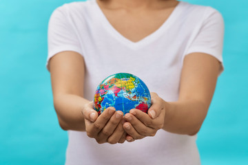 Woman Holding Globe in her Hands