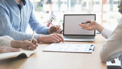 Asian business team meeting present professional investor working with new startup project. discussion and analysis data the charts and graphs. Digital tablet laptop computer design smart phone