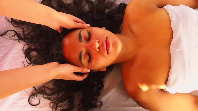 young woman doing healthcare indian traditional treatment in Ayurveda body constitution centre