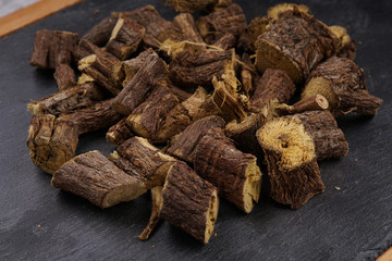 Liquorice roots stack stock photo