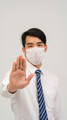 Coronavirus Hygiene concept. Asian businessman wearing hygienic mask to prevent the spread of germs and bacteria and avoid infections corona virus. Businessman with flu virus.