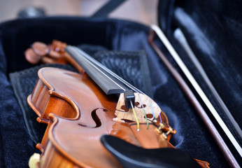violin and bow resting in case © LemonMyrtle