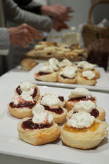 Afternoon tea setting with scones, jam and cream