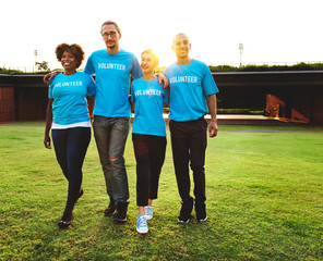 Group of happy and diverse volunteers