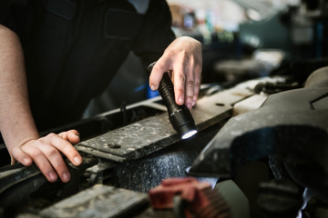Mechanic checking a car