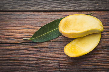 fresh mango on wooden table