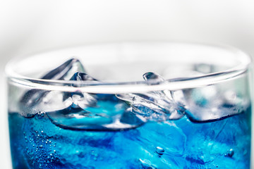 Blue soda drink macro shot