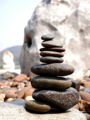 stack of stones on beach nature background