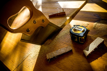 handsaw on woodworking table