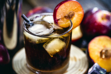 Brazilian caipirinha, typical Brazilian cocktail made with plum, cachaça and sugar. Traditional drink from Brazil known as caipifruta, a tropical summer drink.