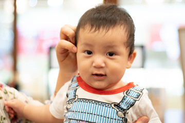 Smile of a 0 year old boy