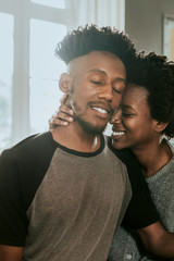 Black couple cuddling