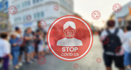 Stop COVID-19. Warning medical protection mask sign on Thailand city blurred background.