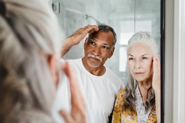 Adorable mixed senior couple